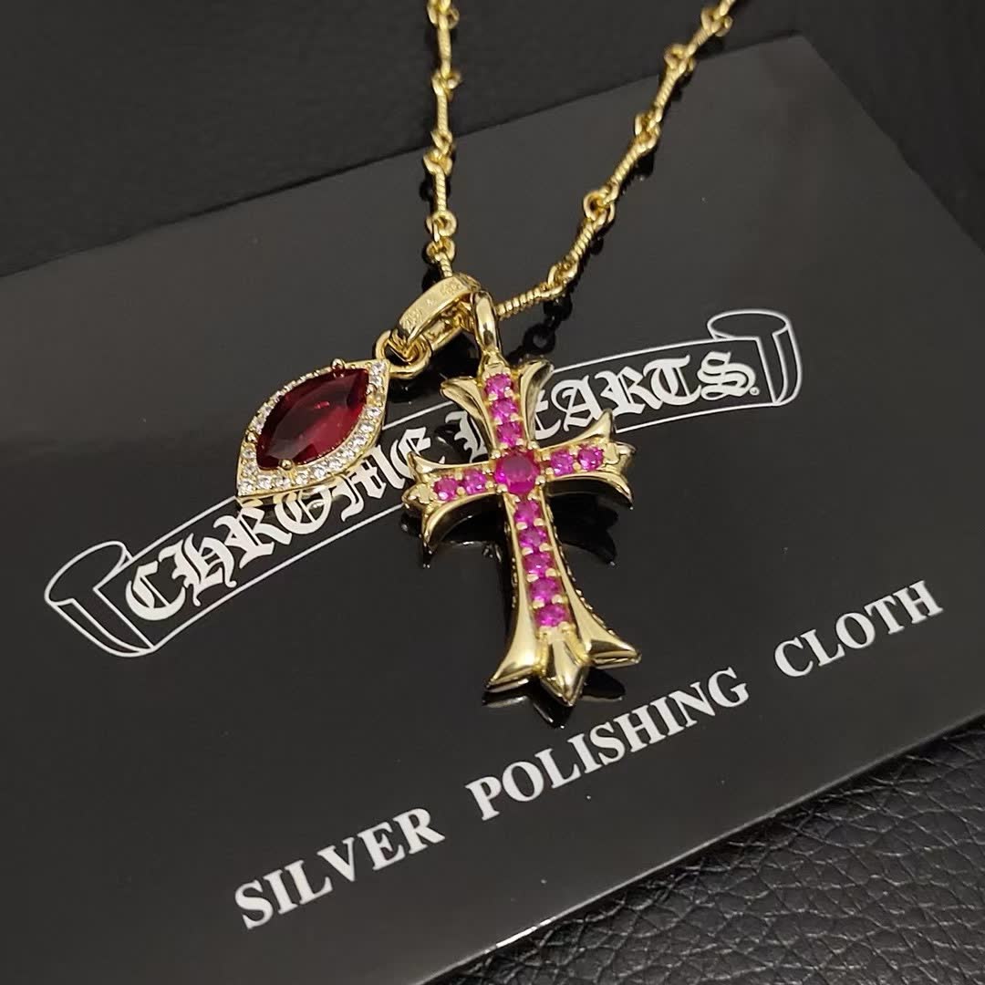 Chrome Hearts Chronic Hearts Gold Plated Cross Pendant with Ruby and Diamond Accents Chrome Hearts Chronic Hearts Gold Plated Cross Pendant with Ruby and Diamond Accents